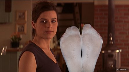 Sidney loves having her socked soles noriced.jpg