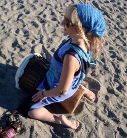 June-Kneeling on Her Drum.jpg