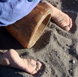 Kneeling down at the Beach Barefoot.jpg