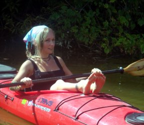 June-Shos us her Soles in the Boat.jpg